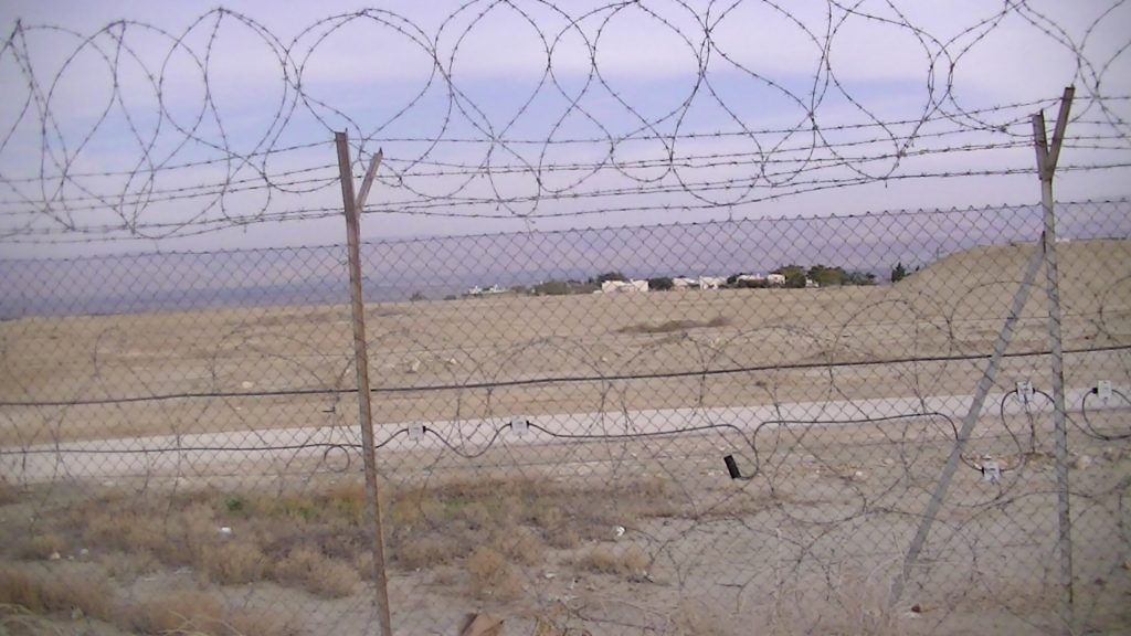 The fence surrounding Beit Ha'Arava, photo taken by Corporate Watch, February 2013
