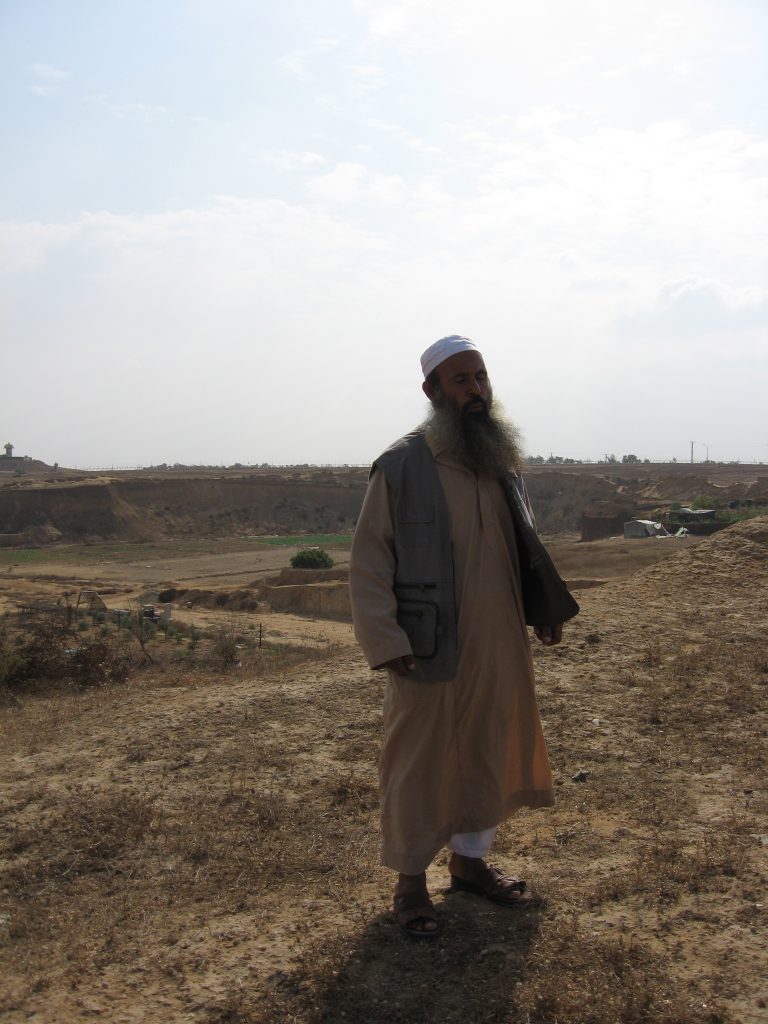 Abu Mousab on his family's land in Al Maghazi, occupied Gaza Strip. Photo by Corporate Watch, November 2013