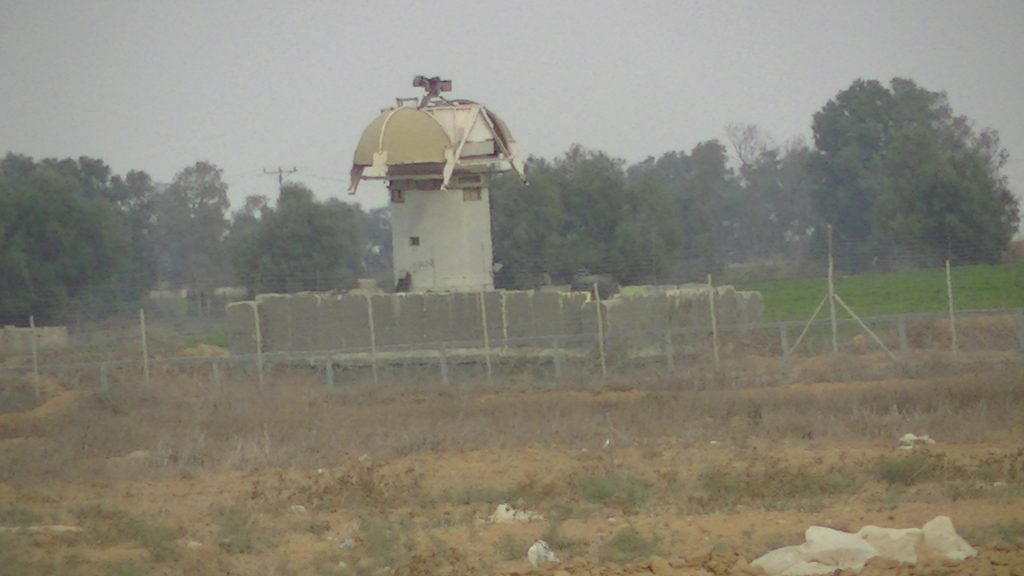 Surveillance tower in the buffer zone in Khuza'a, occupied Gaza Strip. Photo by Corporate Watch, November 2013